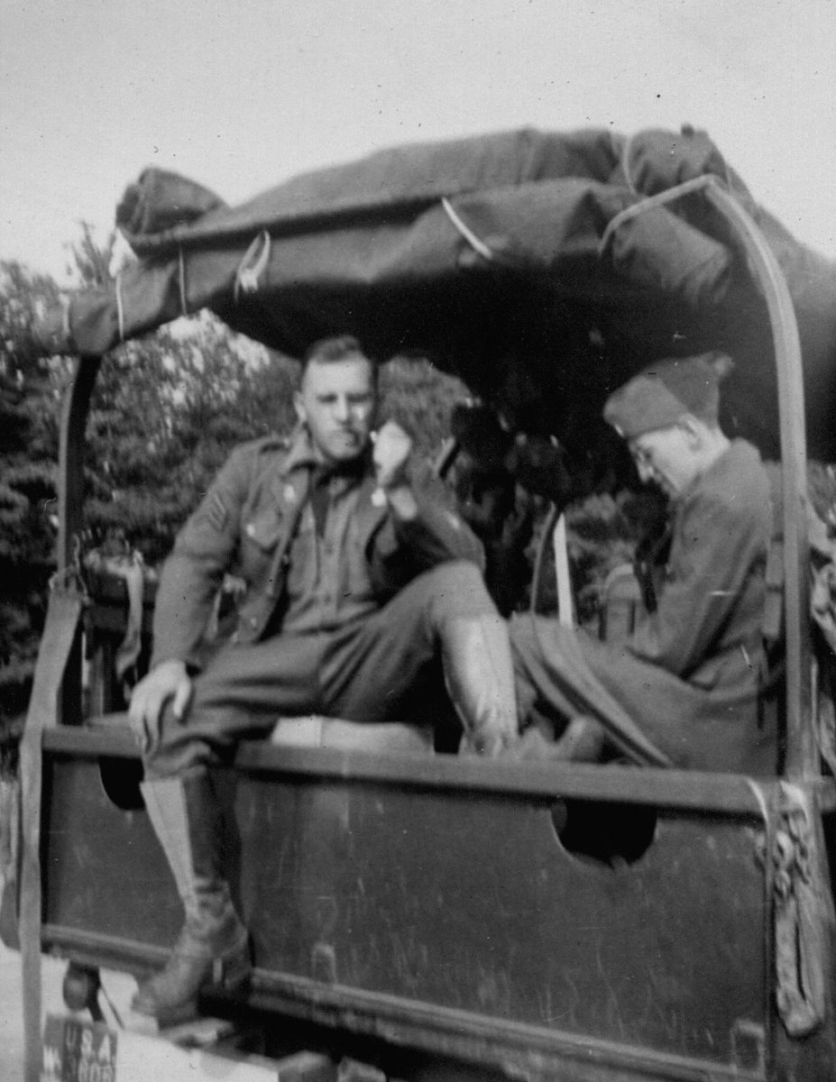 Allen (left) on the back of a truck.
