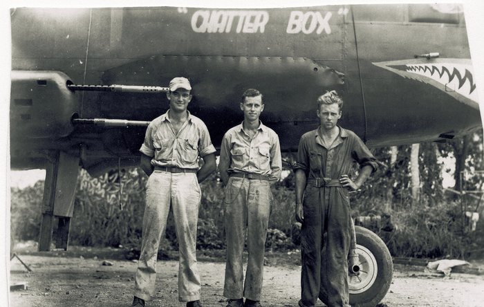 Three crewmen beneath “Chatter Box.”