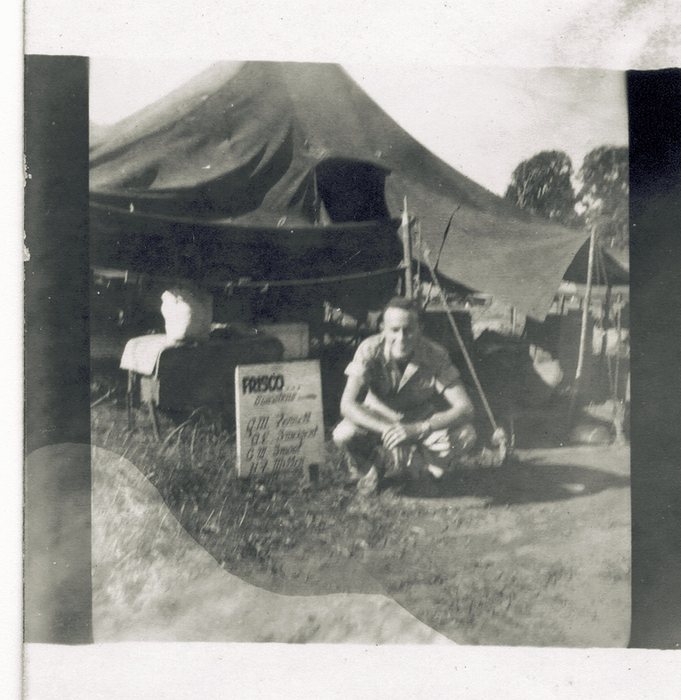 A camp sign reading “FRISCO” with a short list of names beneath it.