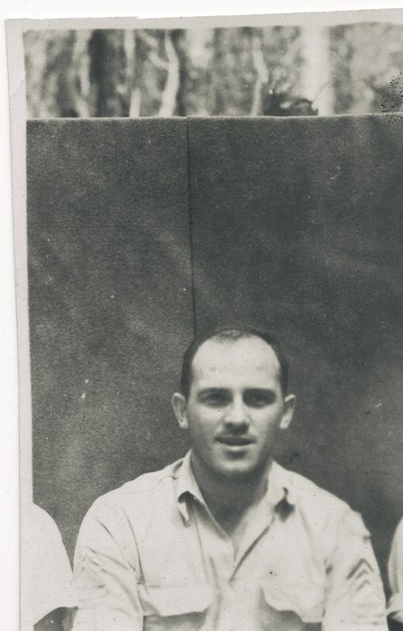 Allen, sergeant's chevrons visible on his sleeve, in a formal portrait.