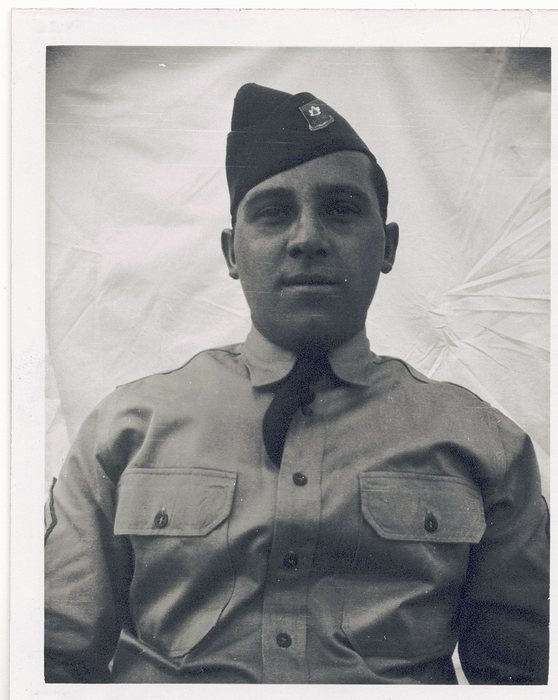 Allen, in a garrison cap, close portrait.