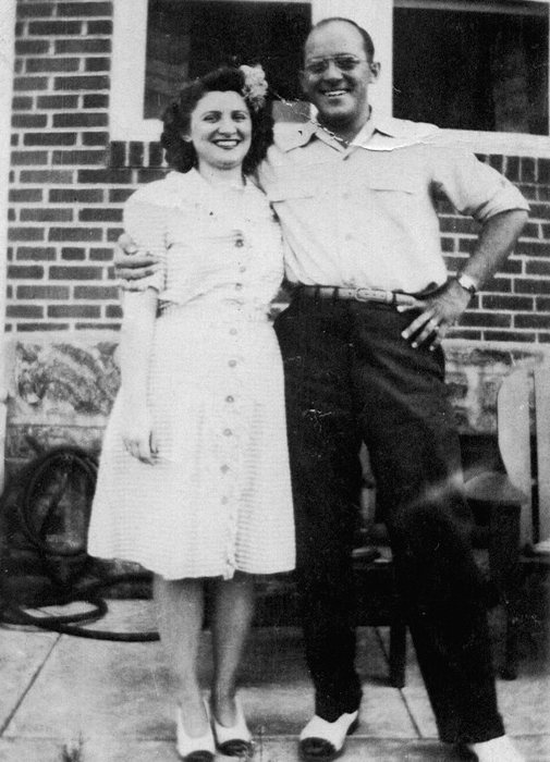 Allen and Catherine, arm in arm, both smiling broadly.